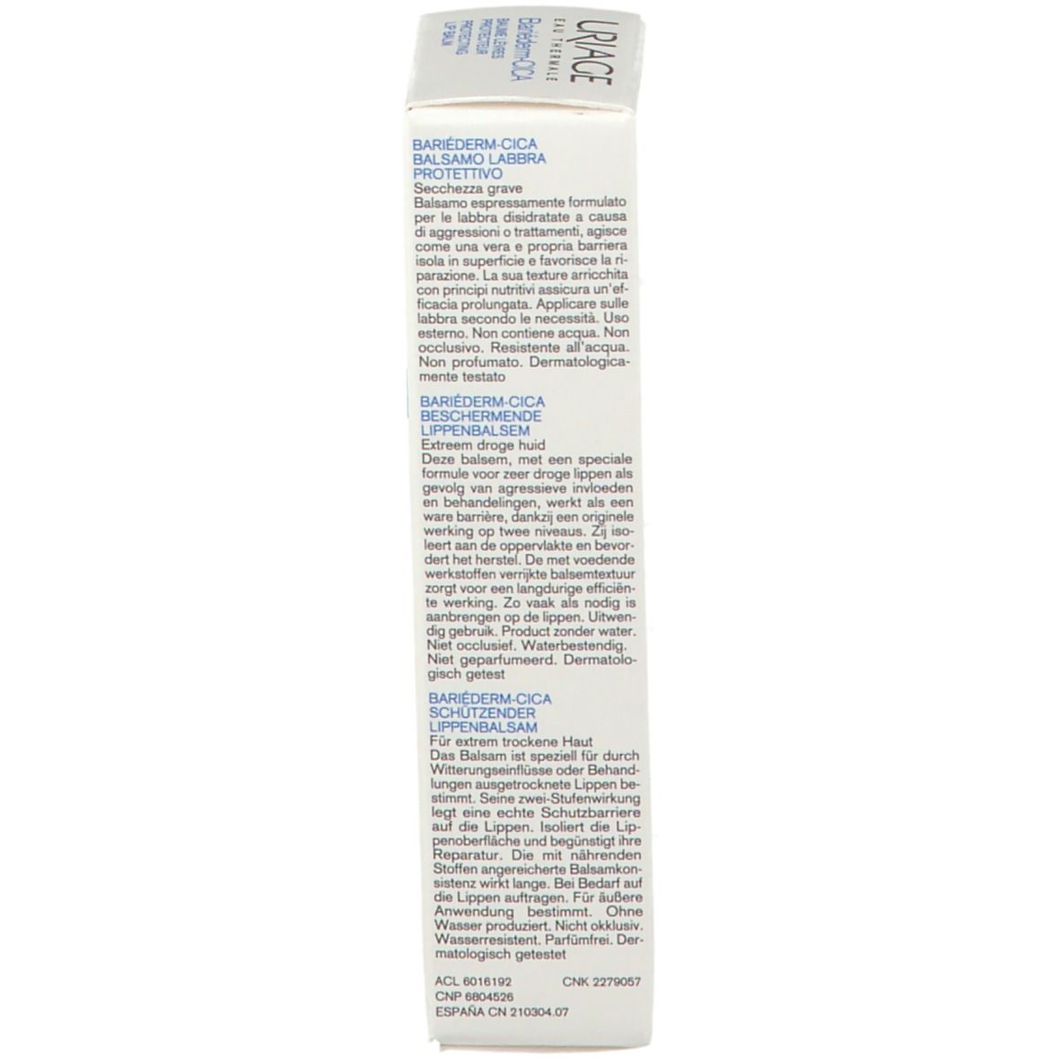 Lato della confezione del balsamo labbra Uriage Bariéderm-Cica. Testo multilingue. Bianco e blu.