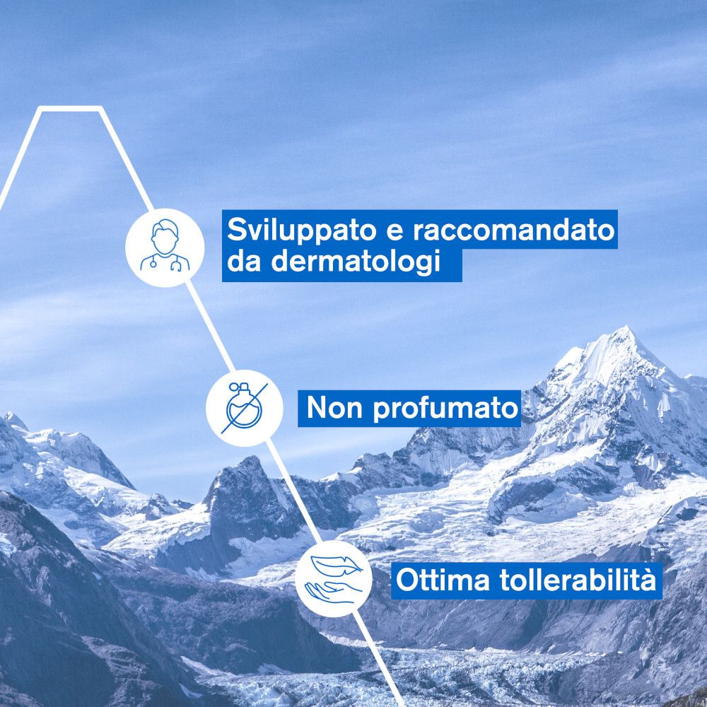 Sviluppato e raccomandato da dermatologi. Non profumato. Ottima tollerabilità. Montagne sullo sfondo.
