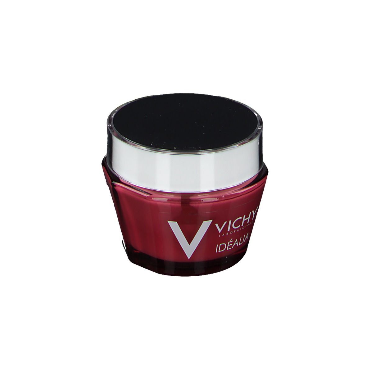 Runder Tiegel mit schwarzem Deckel und silbernem Rand. Rosa Creme mit VICHY und IDÉALIA-Logo.