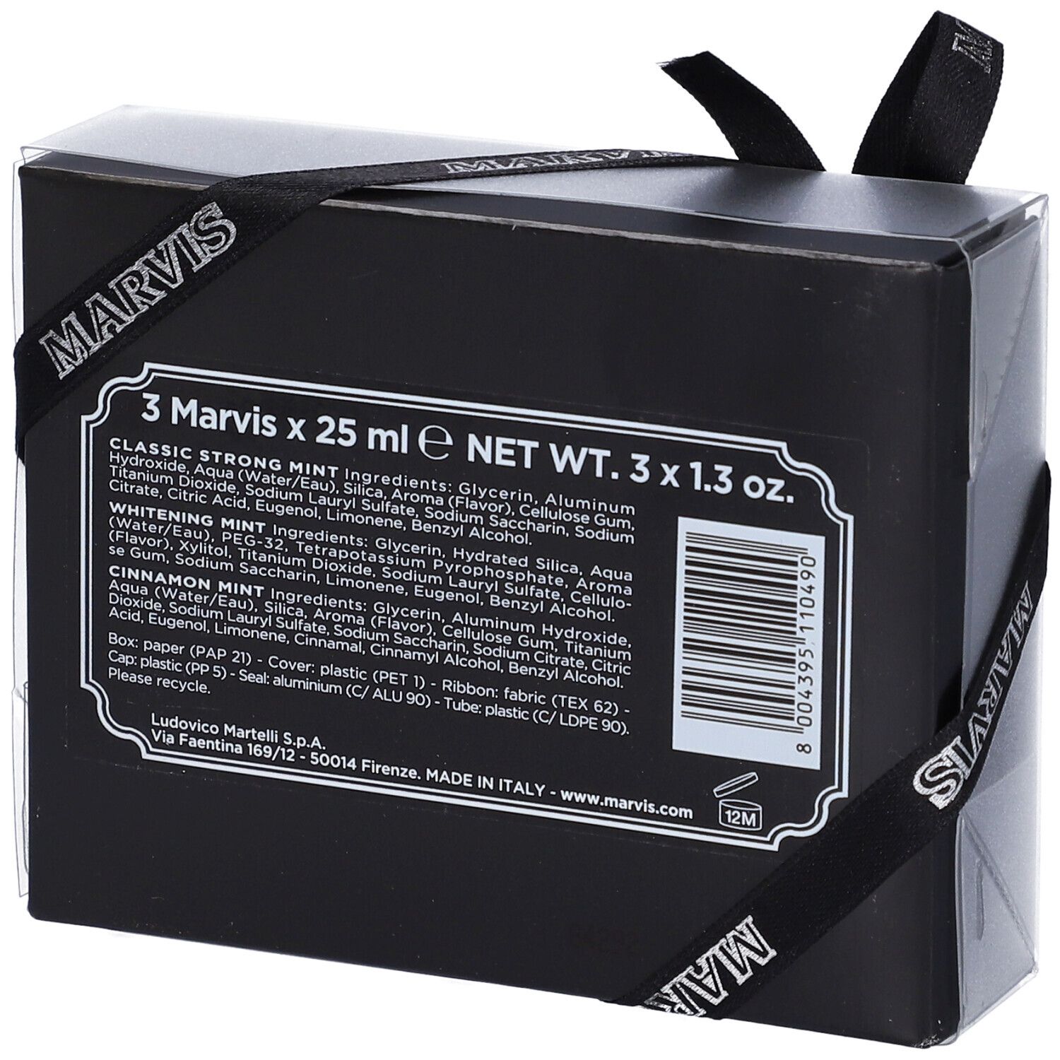 Scatola nera con testo. Contiene informazioni sugli ingredienti e il produttore. Nastro nero.