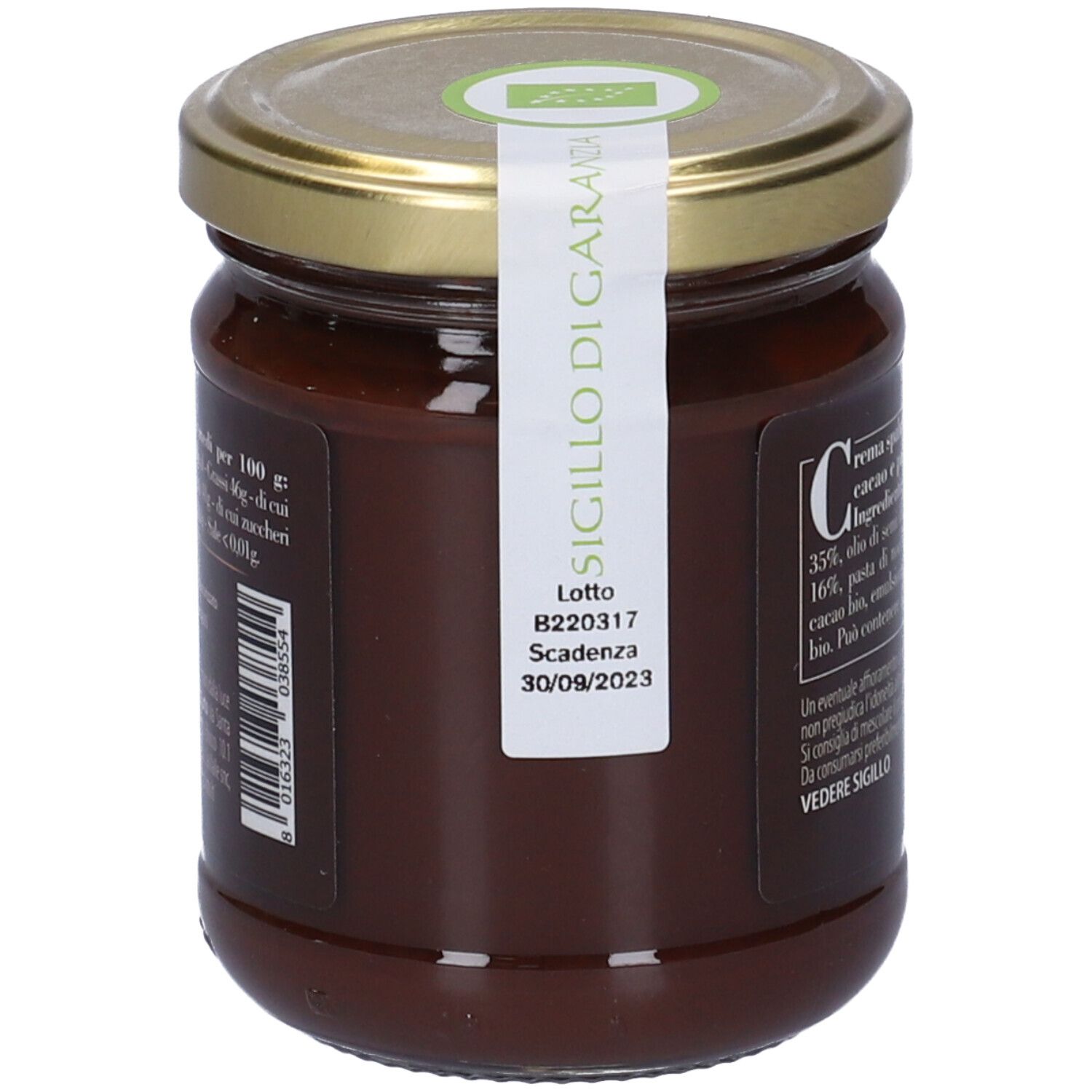 Vasetto di crema Cacao & Nocciole, senza olio di palma, senza glutine, vegana, dolcificata con agave. Etichetta con numero lotto e scadenza.
