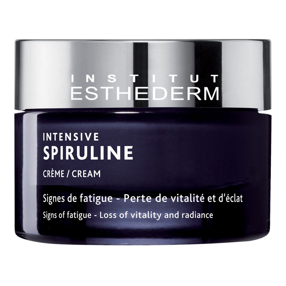 Vaso di crema blu scuro con coperchio argentato. Scritta: Institut Esthederm, Intensive Spiruline. Testo in francese e inglese.