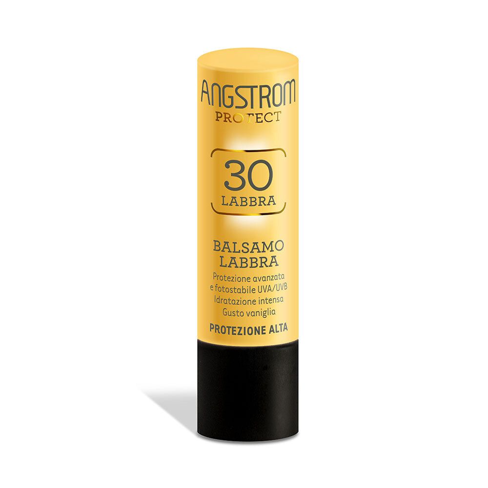 Stick per labbra giallo con base nera. Scritta: ANGSTROM PROTECT, 30 LABBRA, BALSAMO LABBRA, PROTEZIONE ALTA.