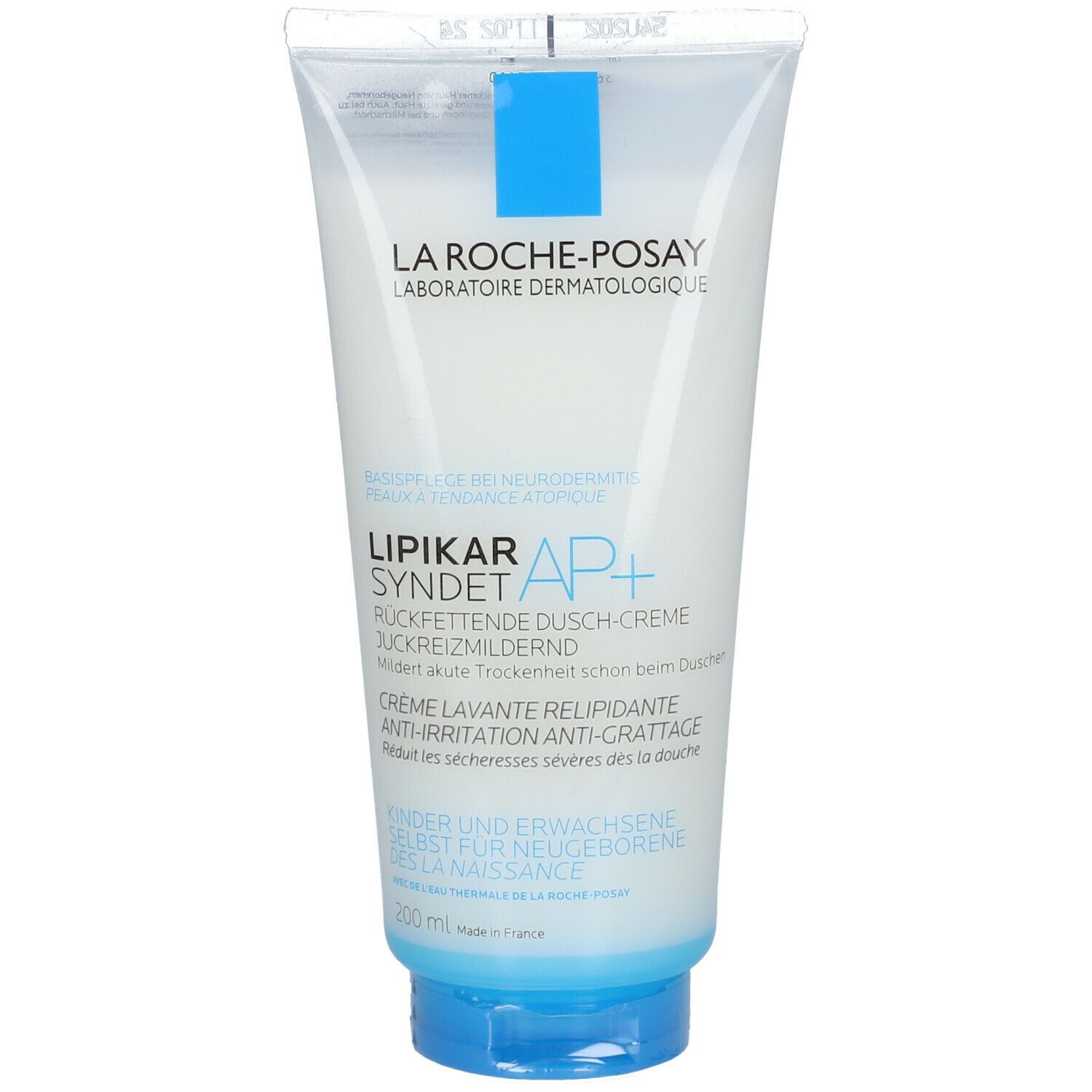 Tube mit blauem Verschluss. Aufschrift: La Roche-Posay, LIPIKAR SYNDET AP+. Text in Deutsch und Französisch. 200 ml.