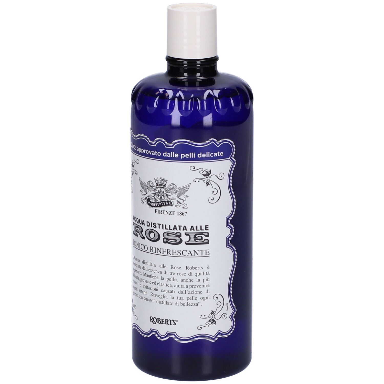 Bouteille bleue avec bouchon blanc. Étiquette avec texte: Acqua Distillata alle Rose, Tonico Rinfrescante. Marque Roberts.