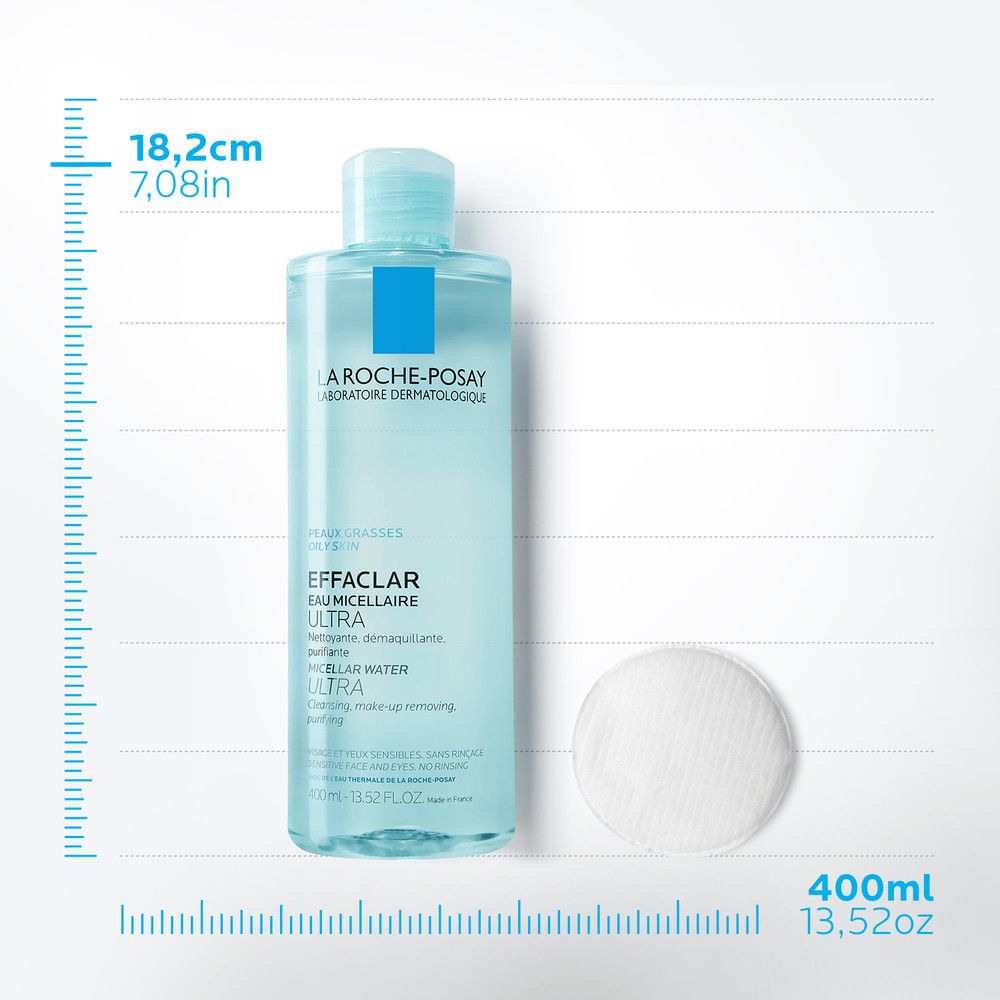 La Roche-Posay Effaclar Acqua Micellare Ultra. Bottiglia e dischetto di cotone. Dimensioni: 18,2 cm di altezza, 400 ml. Testo sulla bottiglia.