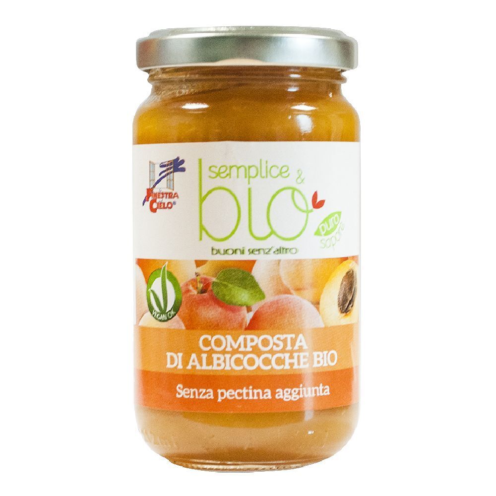 Vasetto di composta di albicocche. Etichetta con nome e logo del prodotto. Coperchio metallico.