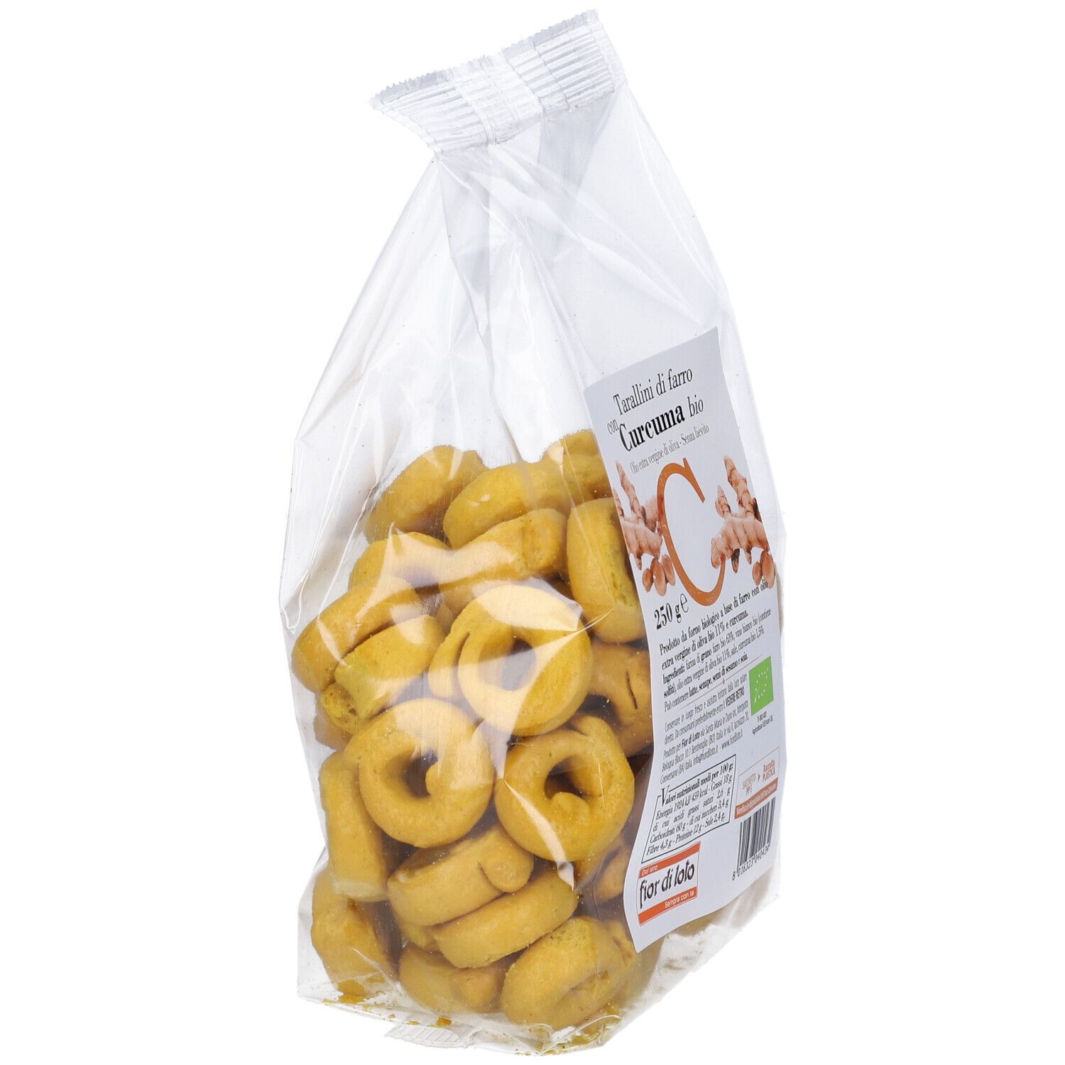 Confezione di tarallini alla curcuma. Confezione trasparente con tarallini gialli a forma di anello. Stampa con informazioni sul prodotto e marchio bio.