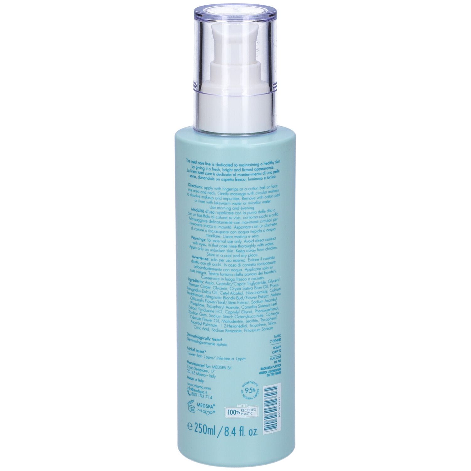 Flacone azzurro con dosatore. Scritta: MIAMO, Vitamin Complex Milk Cleanser. Retro con testo e informazioni sugli ingredienti.