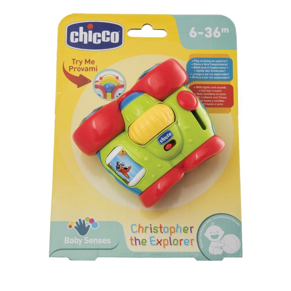 Binocolo giocattolo verde, rosso e giallo. Con stampe e scritta "Christopher the Explorer". Confezionato su cartone giallo.