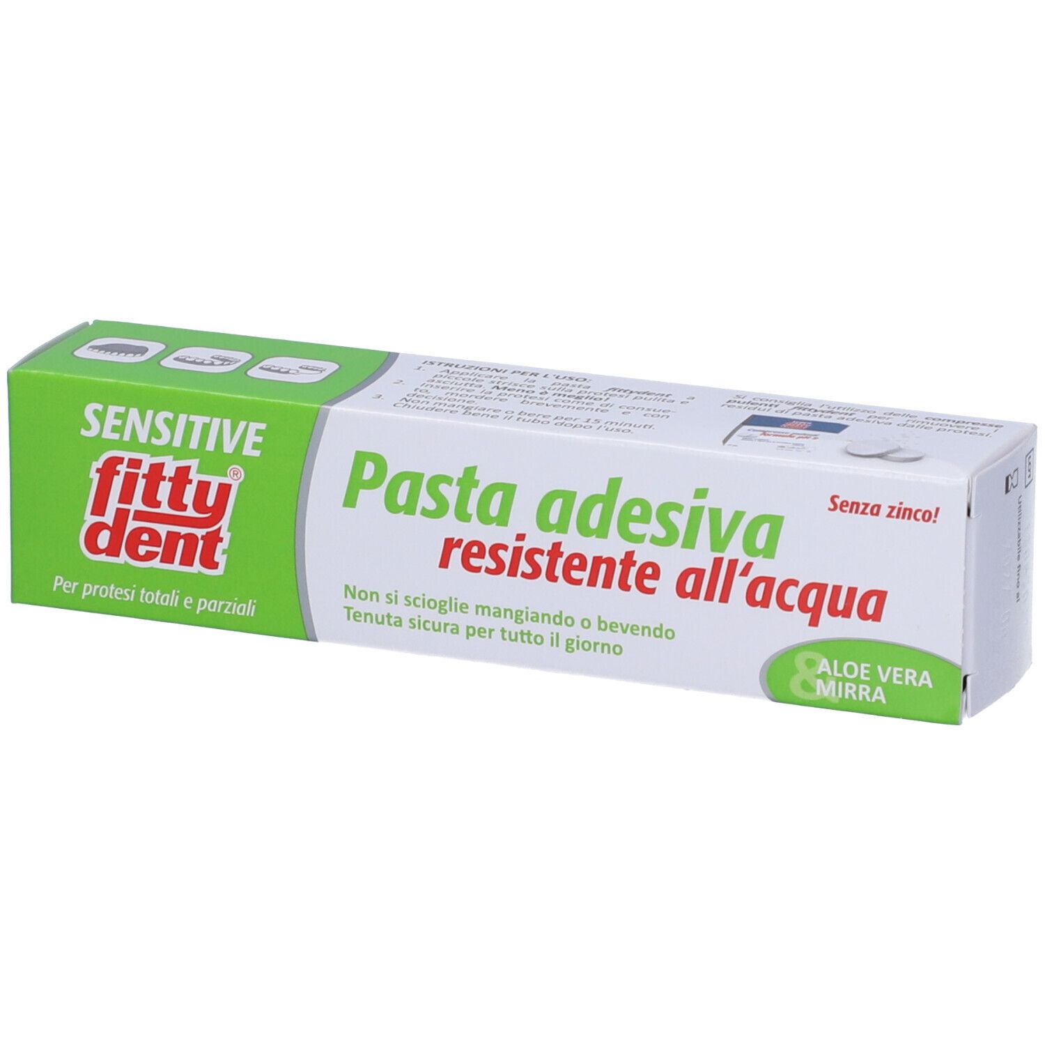 Tubo di dentifricio. Scritta: Fittydent Sensitive Pasta Adesiva resistente all'acqua, Aloe Vera. Confezione verde e bianca.