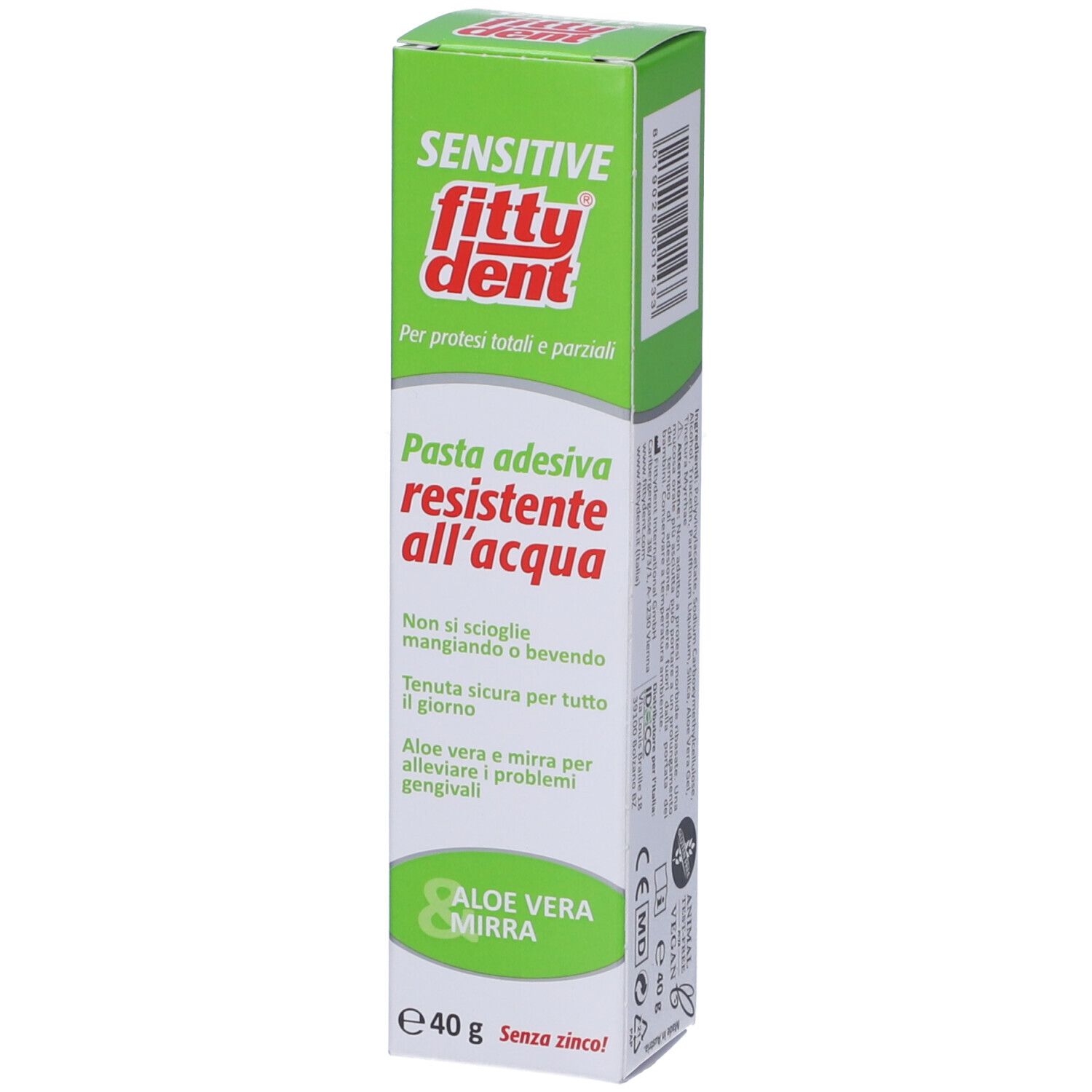 Tubo di dentifricio. Scritta: Fittydent Sensitive Pasta Adesiva resistente all'acqua, Aloe Vera. Confezione verde e bianca.