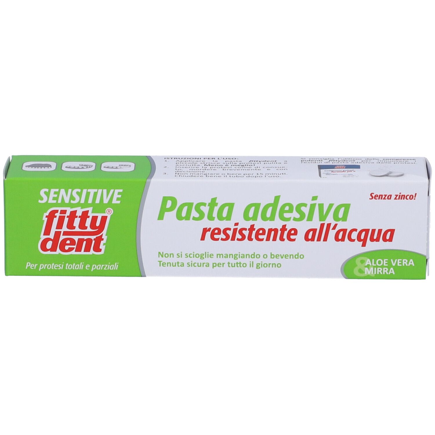 Tubo di dentifricio. Scritta: Fittydent Sensitive Pasta Adesiva resistente all'acqua, Aloe Vera. Confezione verde e bianca.