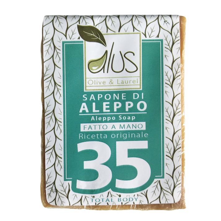 Sapone avvolto in carta. Scritte: Alus Olive & Laurel, Sapone di Aleppo, 35%, Total Body.