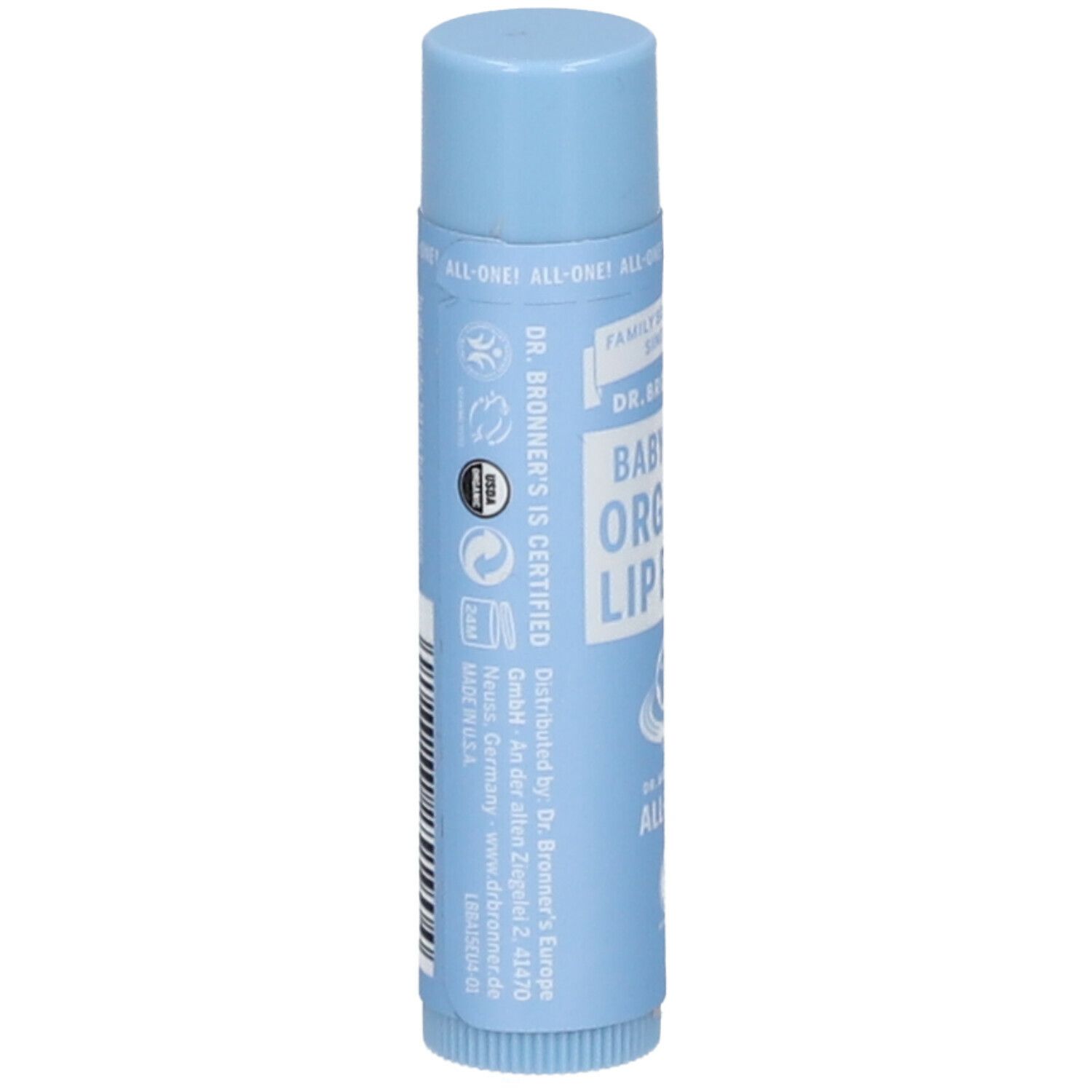 Stick di balsamo per labbra azzurro chiaro. Scritta: Baby-Mild Organic Lip Balm. Marchio: Dr. Bronner's. Con marchio biologico. Testo sul retro.