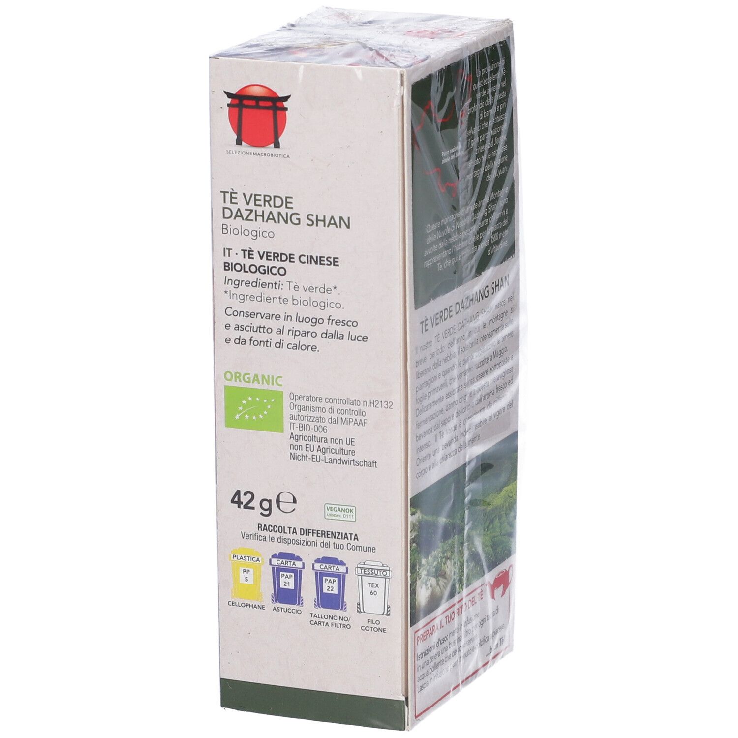 Confezione di tè. Testo: Tè Verde Dazhang Shan, biologico. 42g. Sigillo bio. Simboli di riciclaggio.
