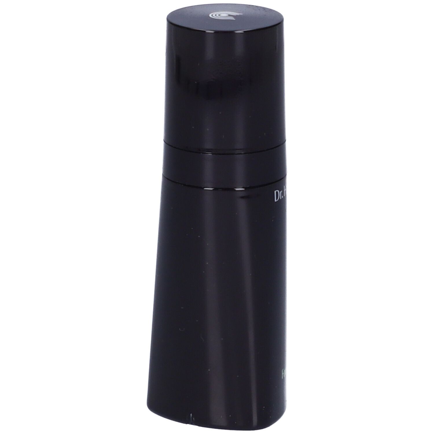 Flacone nero con tappo rotondo. Scritta: Dr. Hauschka. Prodotto: Foundation.