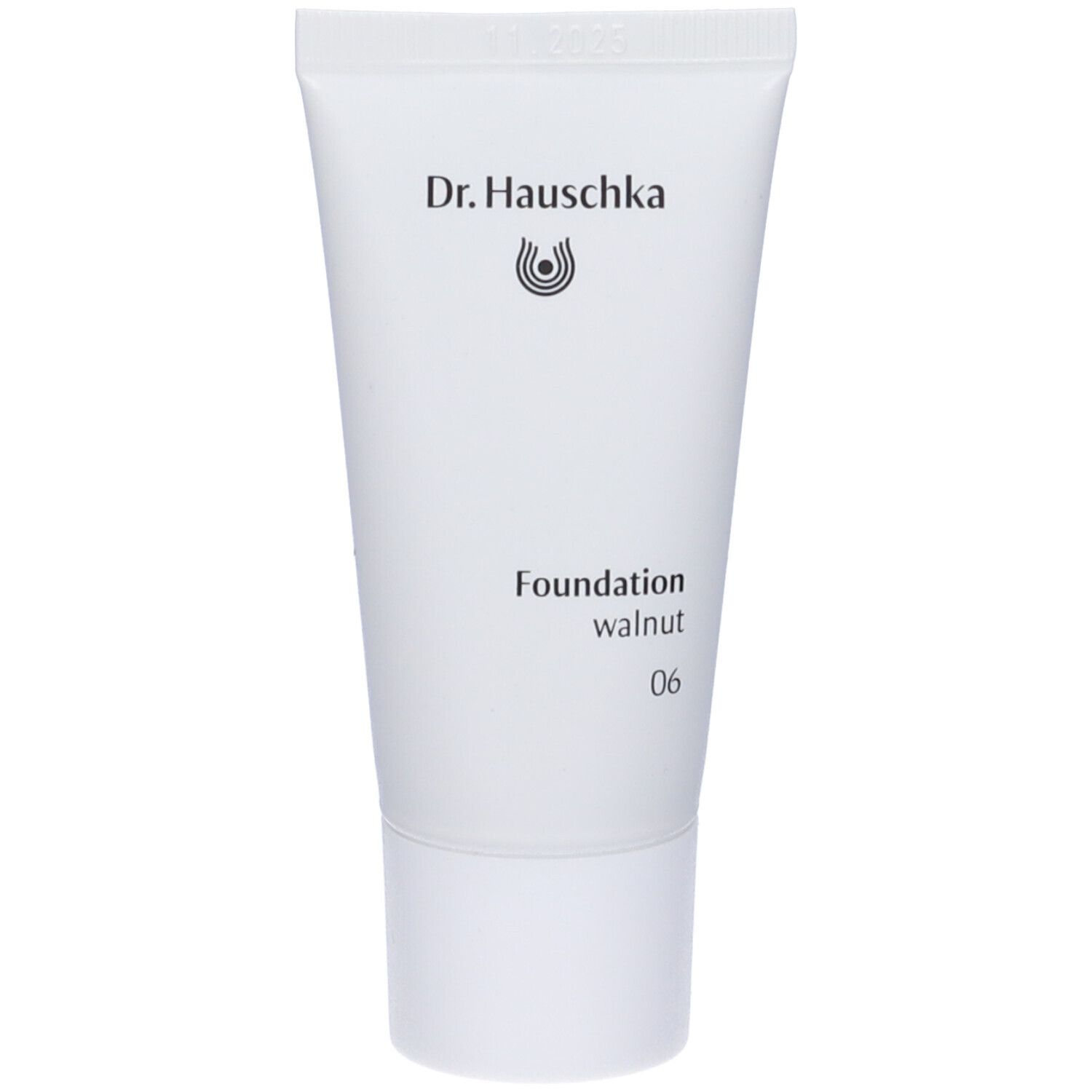 Tubo bianco con logo Dr. Hauschka e scritta Foundation walnut 06. Prodotto per il viso.