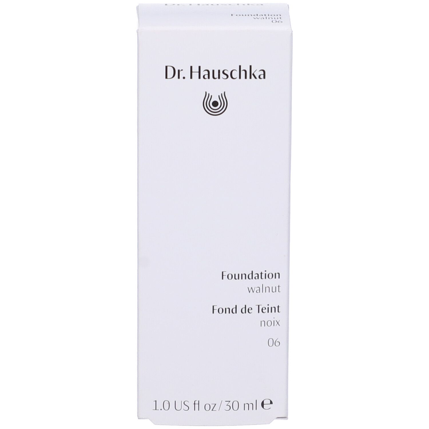 Scatola bianca con logo Dr. Hauschka, Foundation walnut 06, Fond de Teint noix 06. Confezione del prodotto.