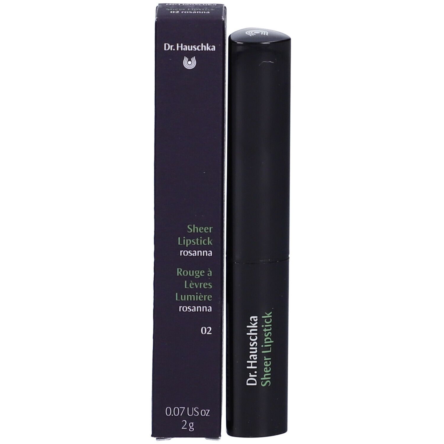 Rossetto e confezione. Confezione con informazioni sul prodotto. Rossetto con 'Dr. Hauschka Sheer Lipstick'.