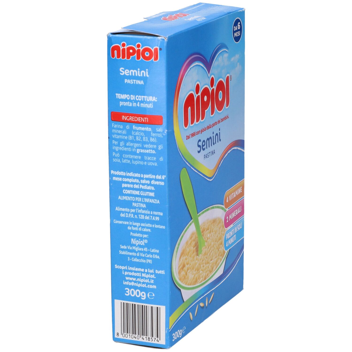 Confezione blu con immagine del prodotto. Contiene Pastina Semini. Scritte: Nipiol, Semini, 4 vitamine, 2 minerali, 300g.