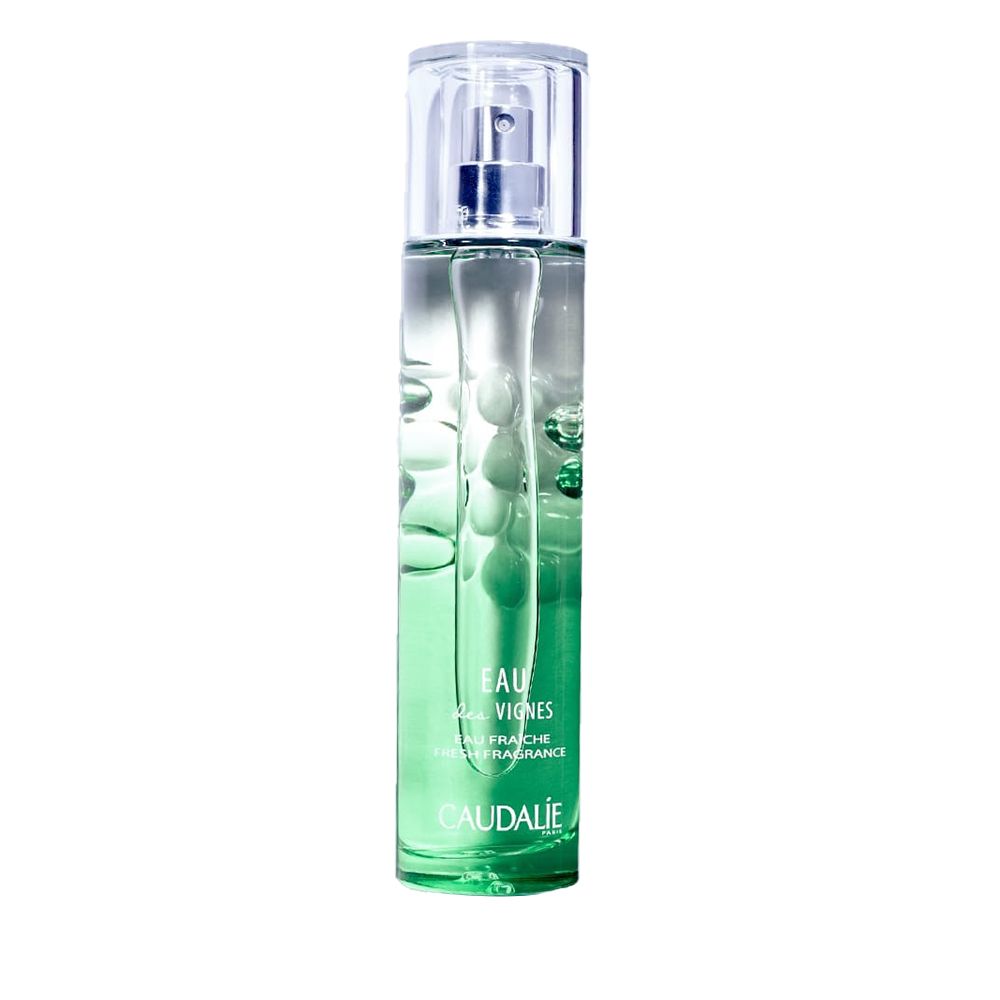 Flacone di profumo verde. Scritta: Eau des Vignes, Caudalie. Erogatore trasparente.