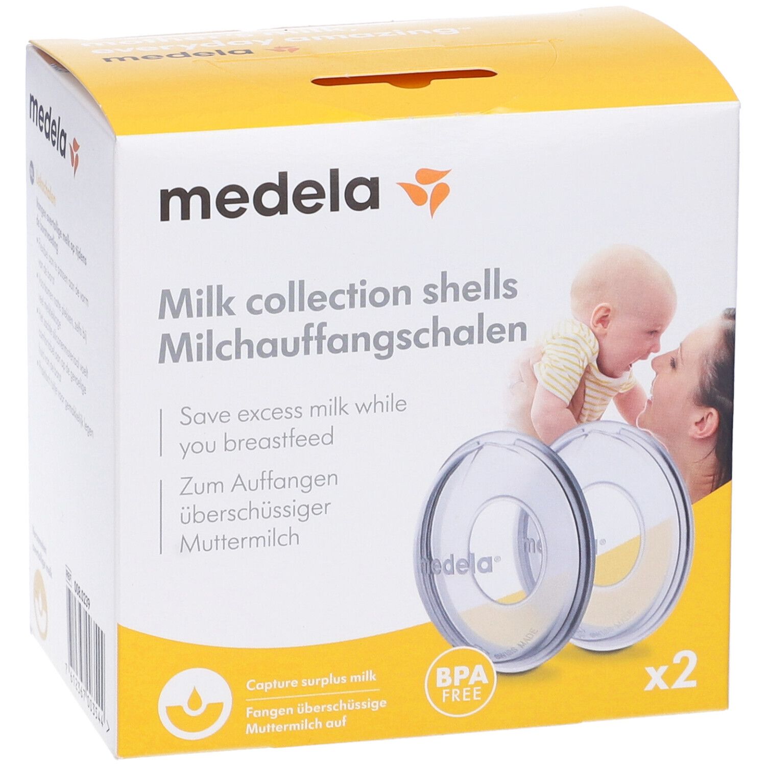 Confezione di due coppette raccoglilatte Medela. Senza BPA. Immagine di madre e bambino. Testo in inglese e tedesco.