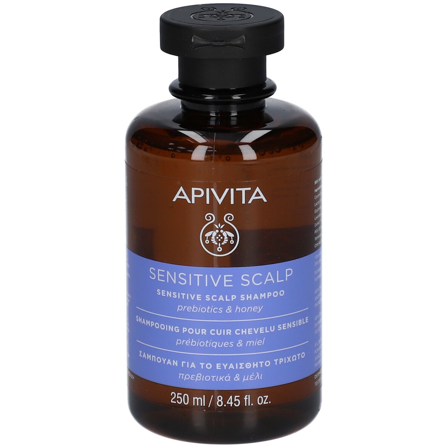Flacone marrone con tappo nero. Scritta: APIVITA, Sensitive Scalp Shampoo, 250 ml.