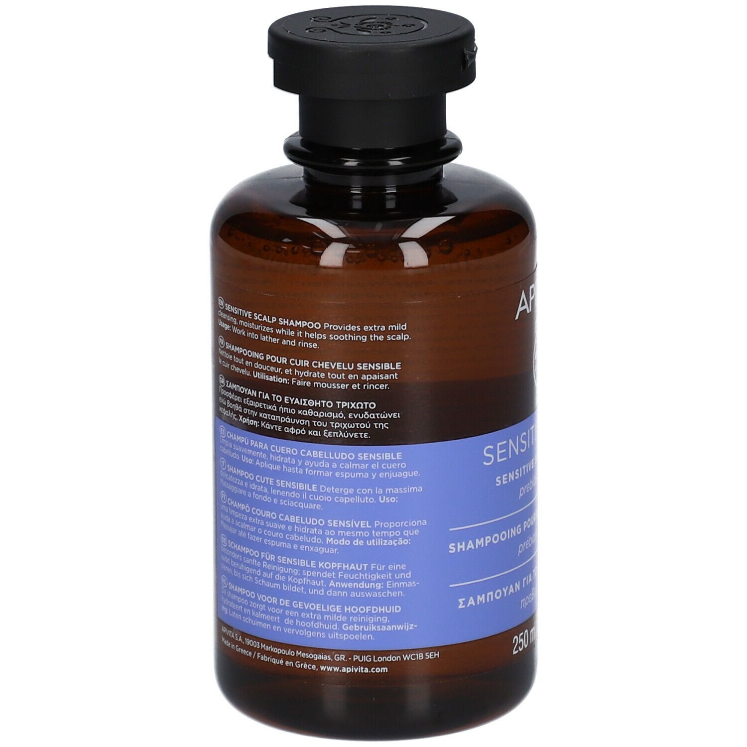 Retro del flacone marrone. Scritta: APIVITA, Sensitive Scalp Shampoo. Diverse lingue.