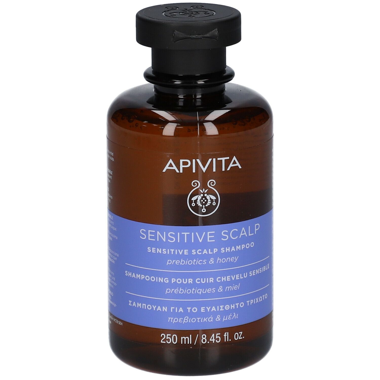 Flacone marrone con tappo nero. Scritta: APIVITA, Sensitive Scalp Shampoo, 250 ml.