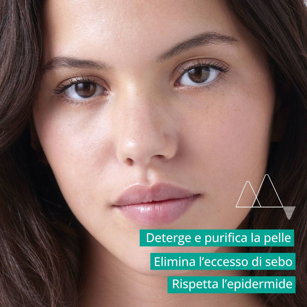 Viso di una donna. Testo: Deterge e purifica la pelle, elimina l'eccesso di sebo, rispetta l'epidermide.