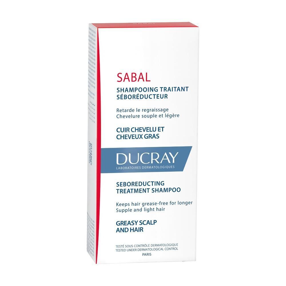 Scatola bianca con coperchio rosso. Scritte: Sabal, Shampooing traitant séboréducteur, Ducray.