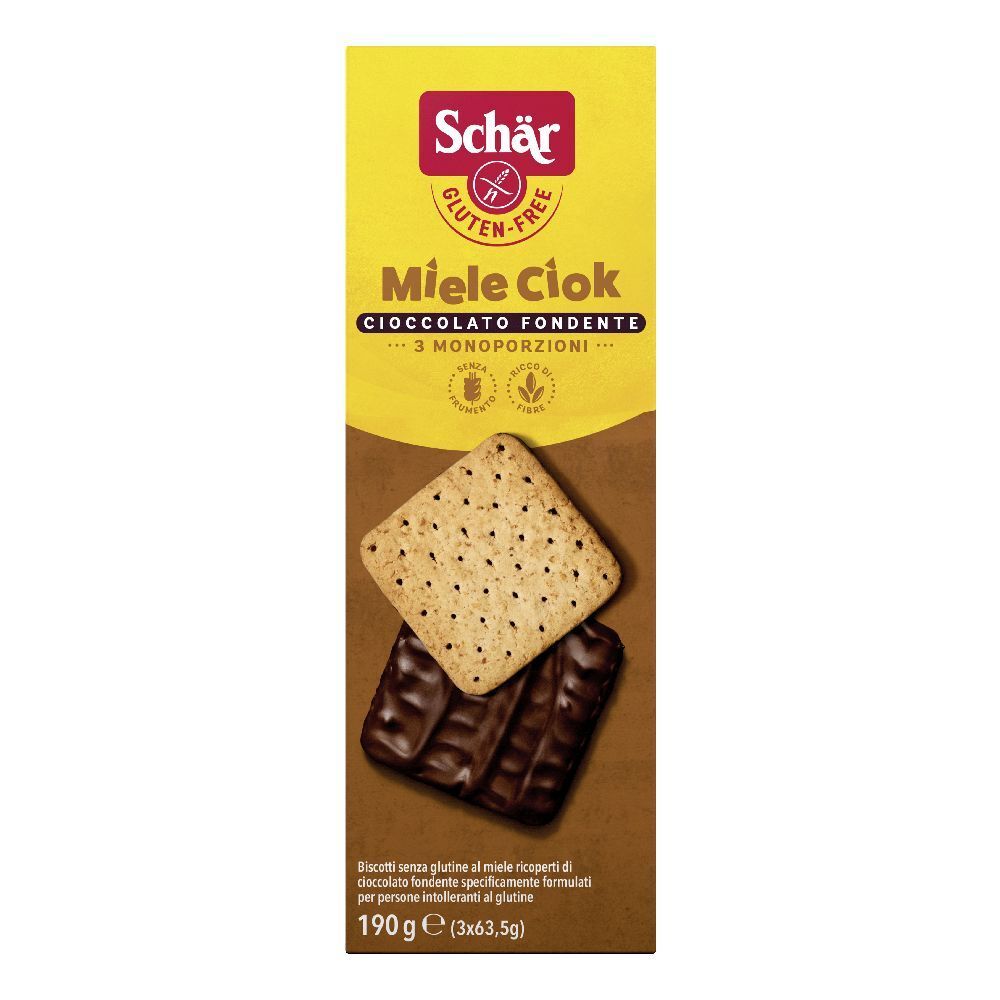Scatola di biscotti Miele Ciok senza glutine. Due biscotti, uno ricoperto di cioccolato, sono mostrati sulla confezione.