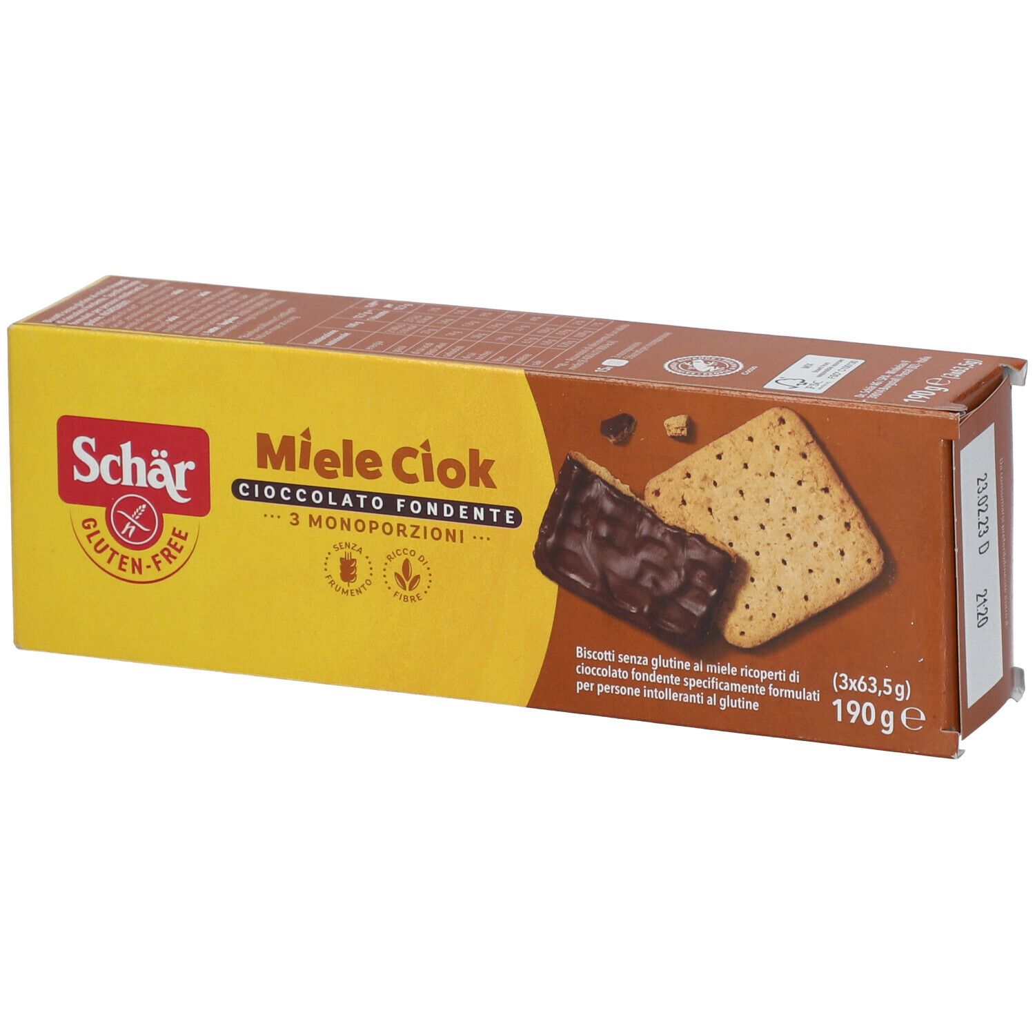 Scatola di biscotti Miele Ciok. Sulla confezione sono raffigurati due biscotti, uno ricoperto di cioccolato.