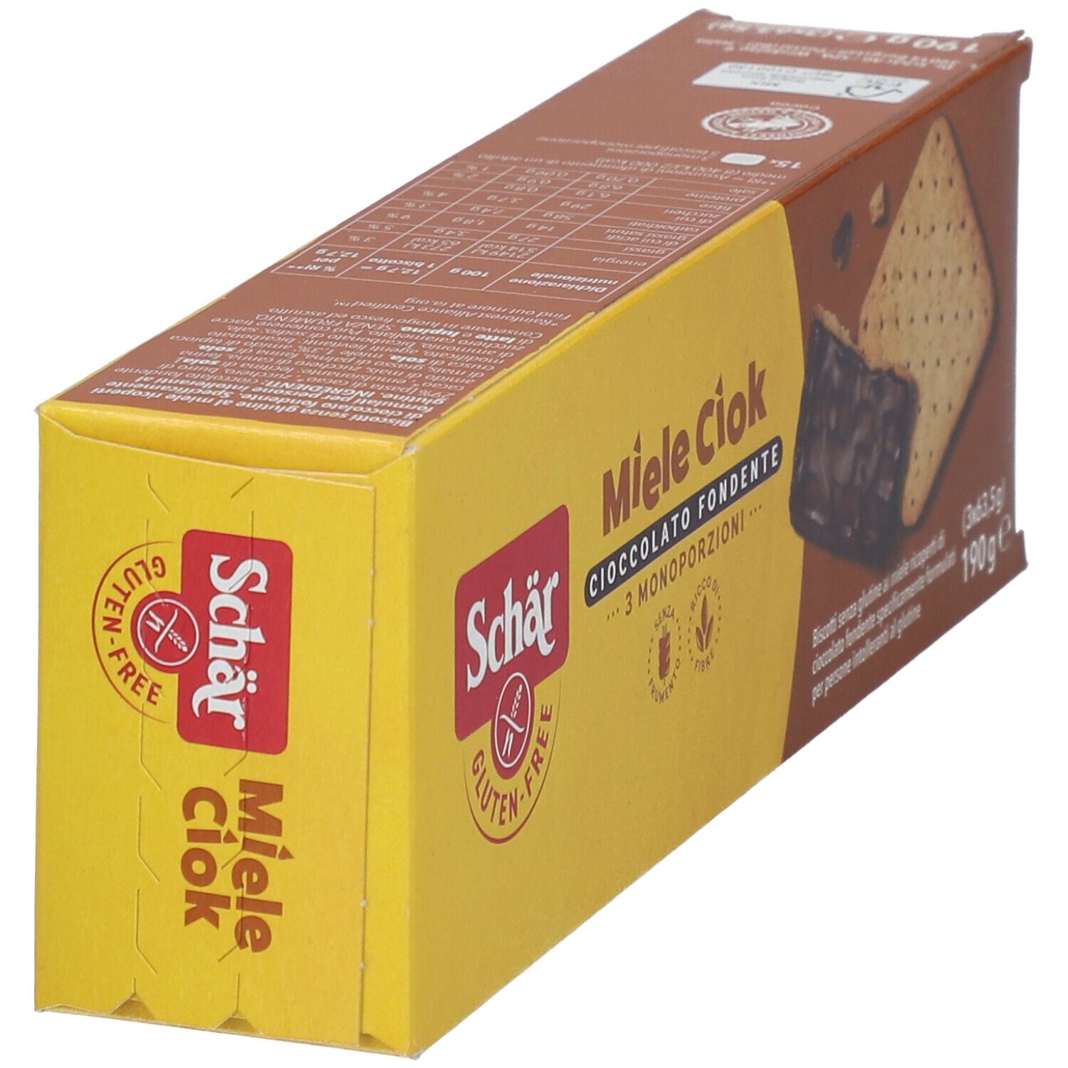 Scatola di biscotti Miele Ciok. La confezione mostra due biscotti, uno ricoperto di cioccolato, in una vista obliqua.