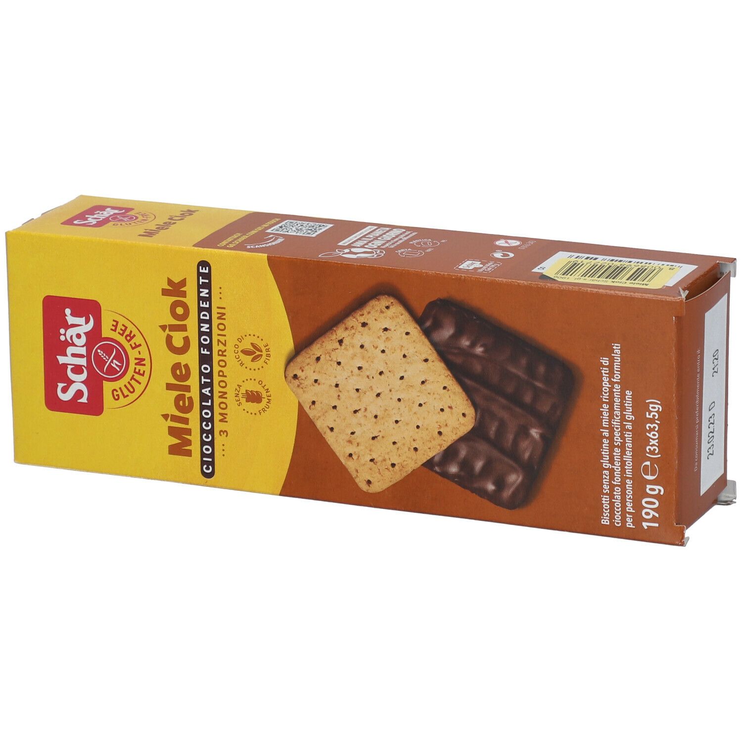 Scatola di biscotti Miele Ciok. Sulla confezione sono raffigurati due biscotti, uno ricoperto di cioccolato.