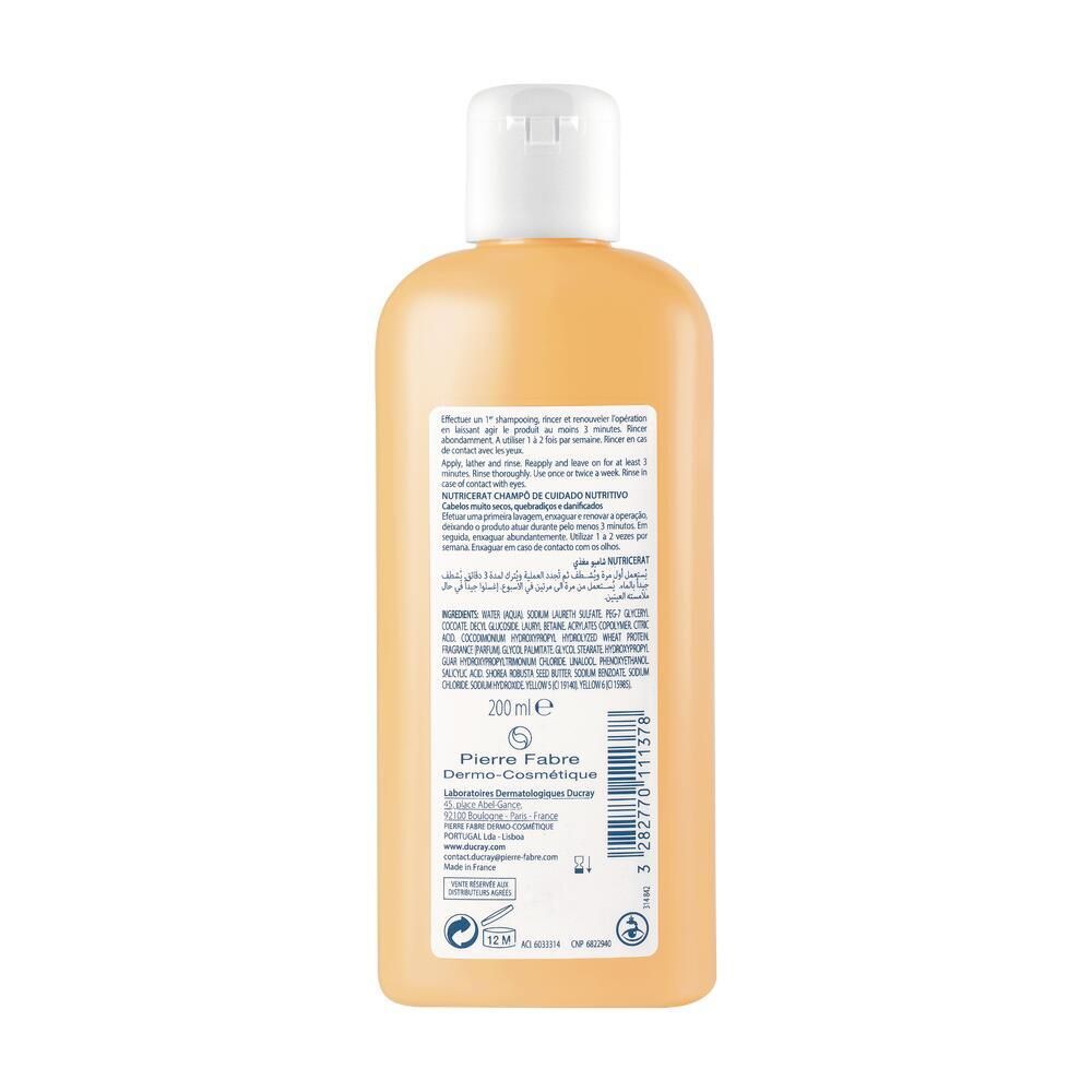 Dos d'un flacon jaunâtre avec bouchon blanc. Texte multilingue. 200 ml. Pierre Fabre.