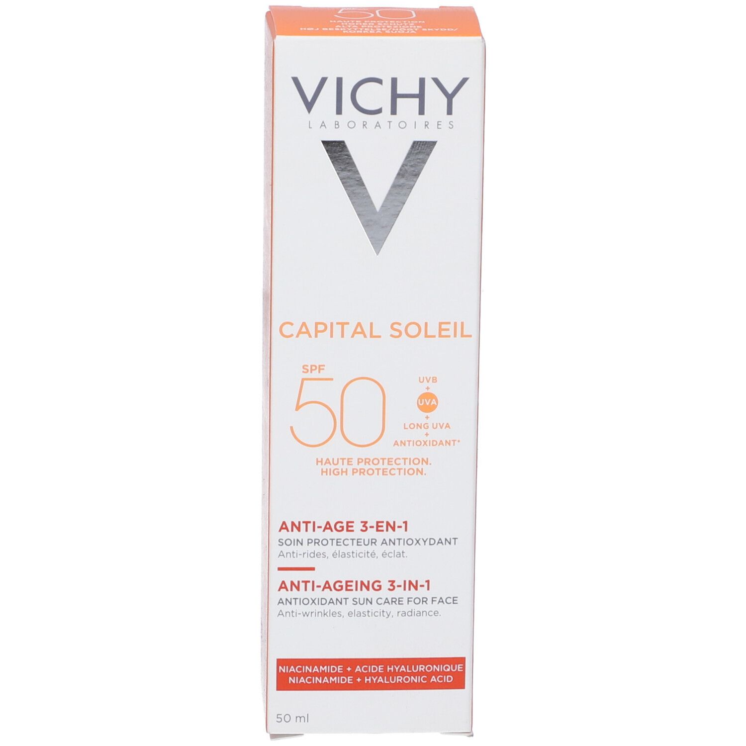Kartonverpackung. Aufschrift: VICHY, CAPITAL SOLEIL SPF 50, Anti-Age 3-in-1. Enthält Hyaluronsäure. Orangefarbener Hintergrund.