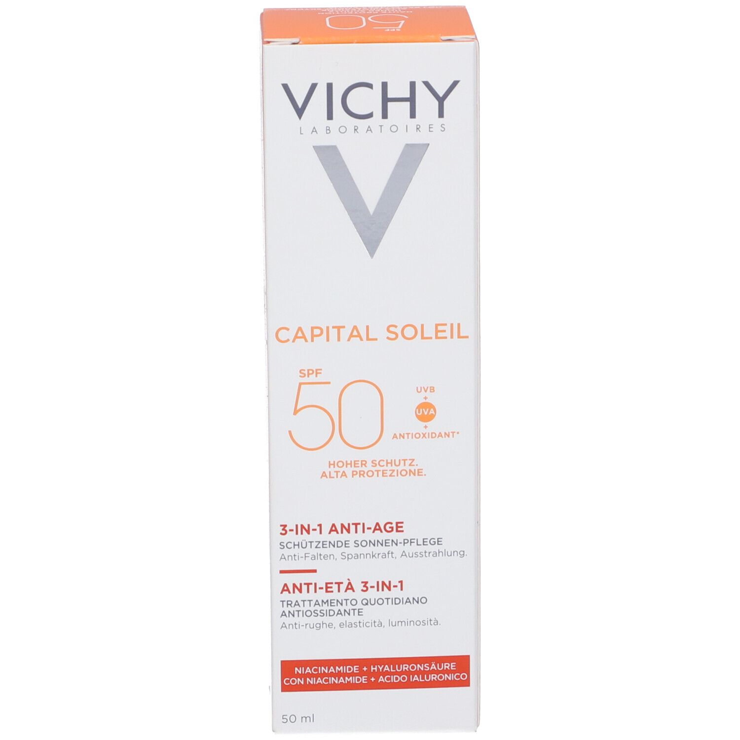 Kartonverpackung. Aufschrift: VICHY, CAPITAL SOLEIL SPF 50, Anti-Age 3-in-1. Mit Hyaluronsäure. Orangefarbener Hintergrund.