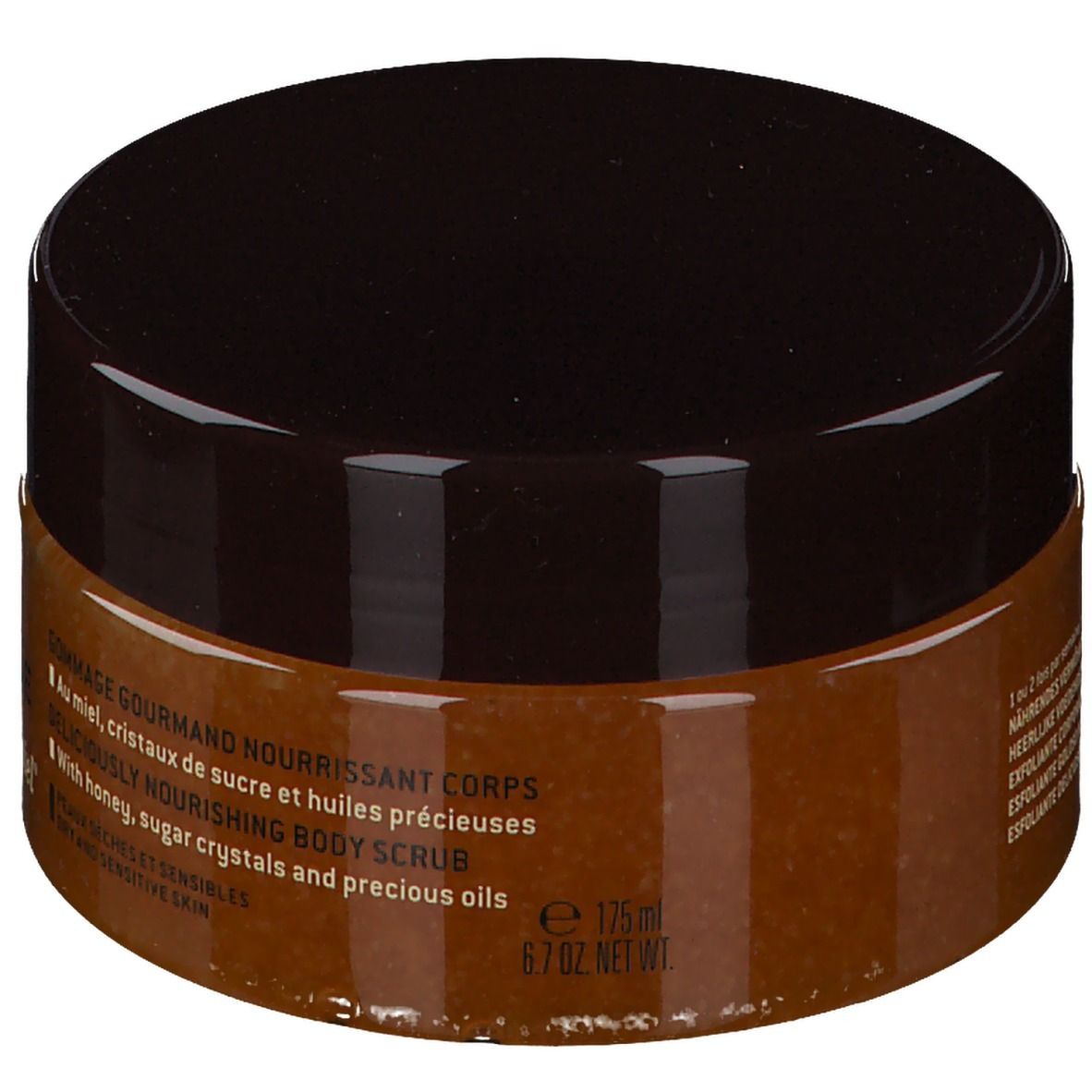 NUXE Rêve de Miel® Scrub Corpo. Vasetto chiuso con coperchio marrone. Testo: Gommage Gourmand Nourrissant Corps.