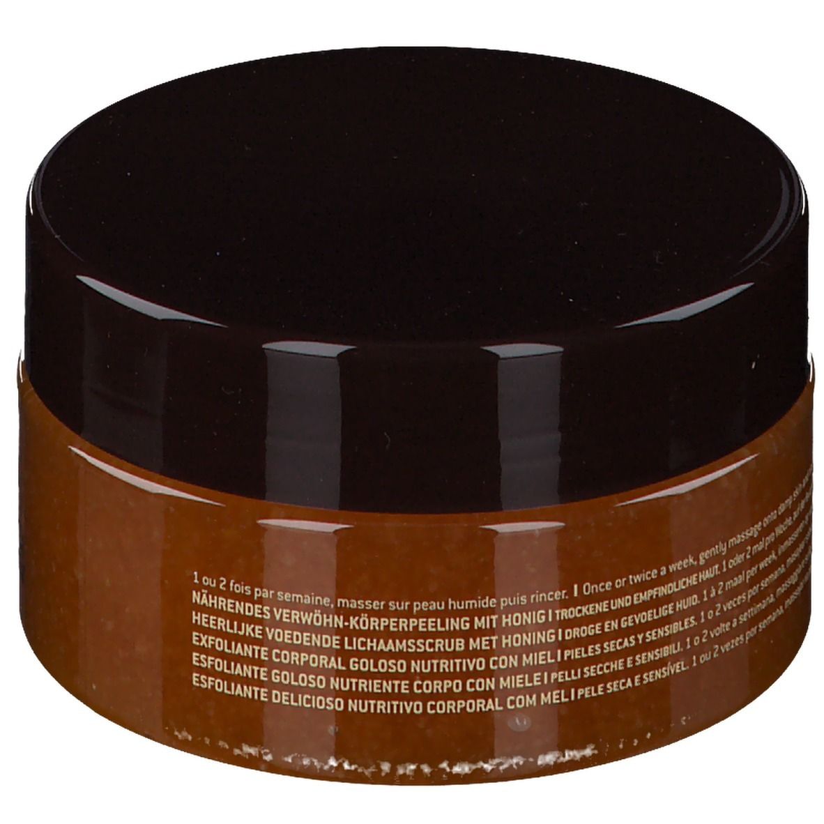 NUXE Rêve de Miel® Scrub Corpo. Vasetto chiuso con coperchio marrone. Testo: Gommage Gourmand Nourrissant Corps.