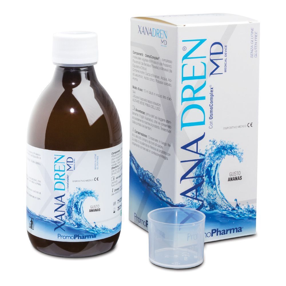 Bottiglia marrone, tappo bianco, bicchiere e confezione. Scritta: XANADREN MD, PromoPharma. Gusto ananas.