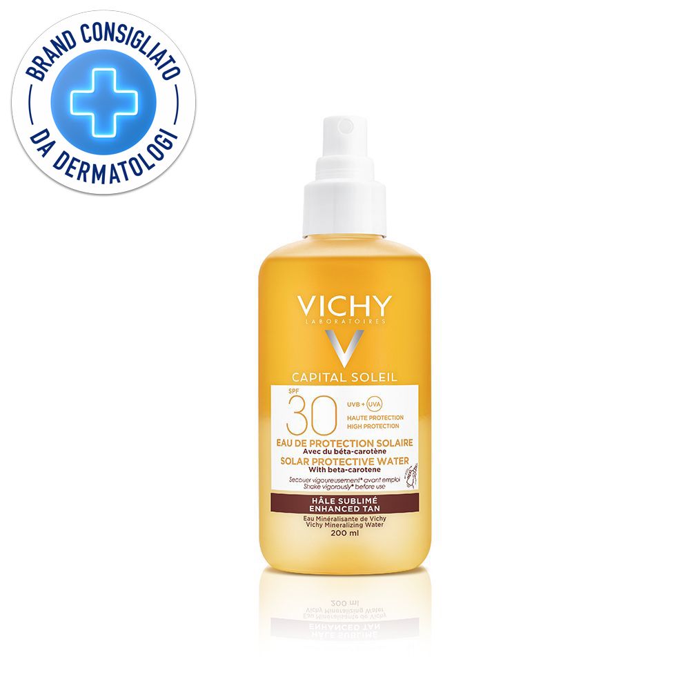 Spray solare LSF 30. Liquido giallo in flacone spray. Con logo e testo.