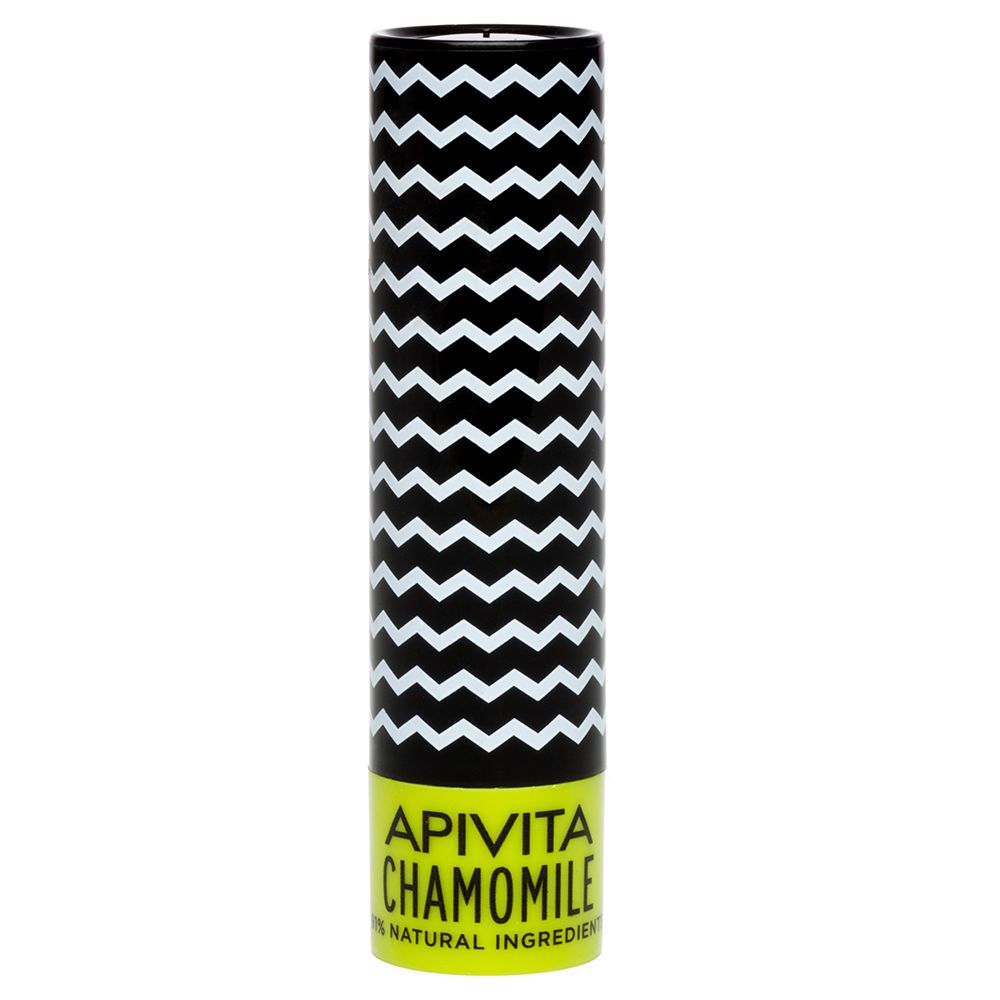 Confezione cilindrica con motivo a zig-zag bianco e nero. Scritta: APIVITA CHAMOMILE, 100% NATURAL INGREDIENTS. Base gialla.