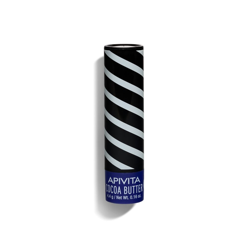 Stick per labbra a strisce bianche e nere. Base blu con APIVITA Cocoa Butter e testo SPF20.