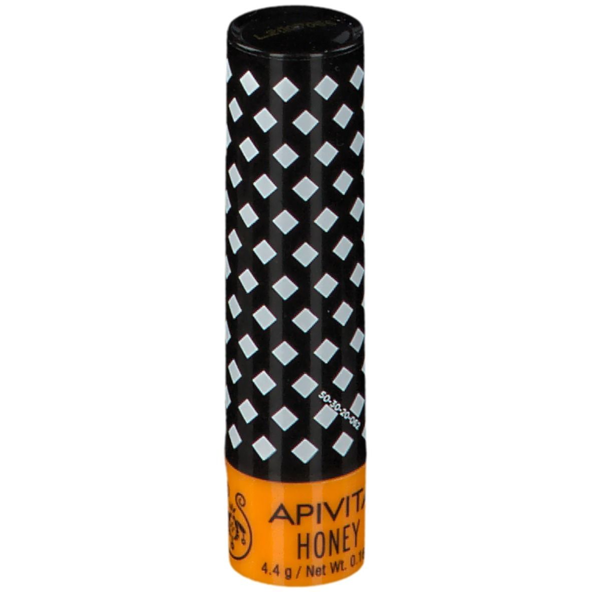 Stick balsamo labbra. Cilindrico, nero con motivo a rombi bianchi. Base arancione con "APIVITA HONEY" e logo.