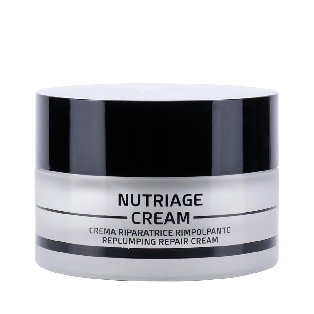 Vasetto di crema con coperchio nero. Scritta: Nutriage Cream, Crema Riparatrice Rimpolpante, Replumping Repair Cream.