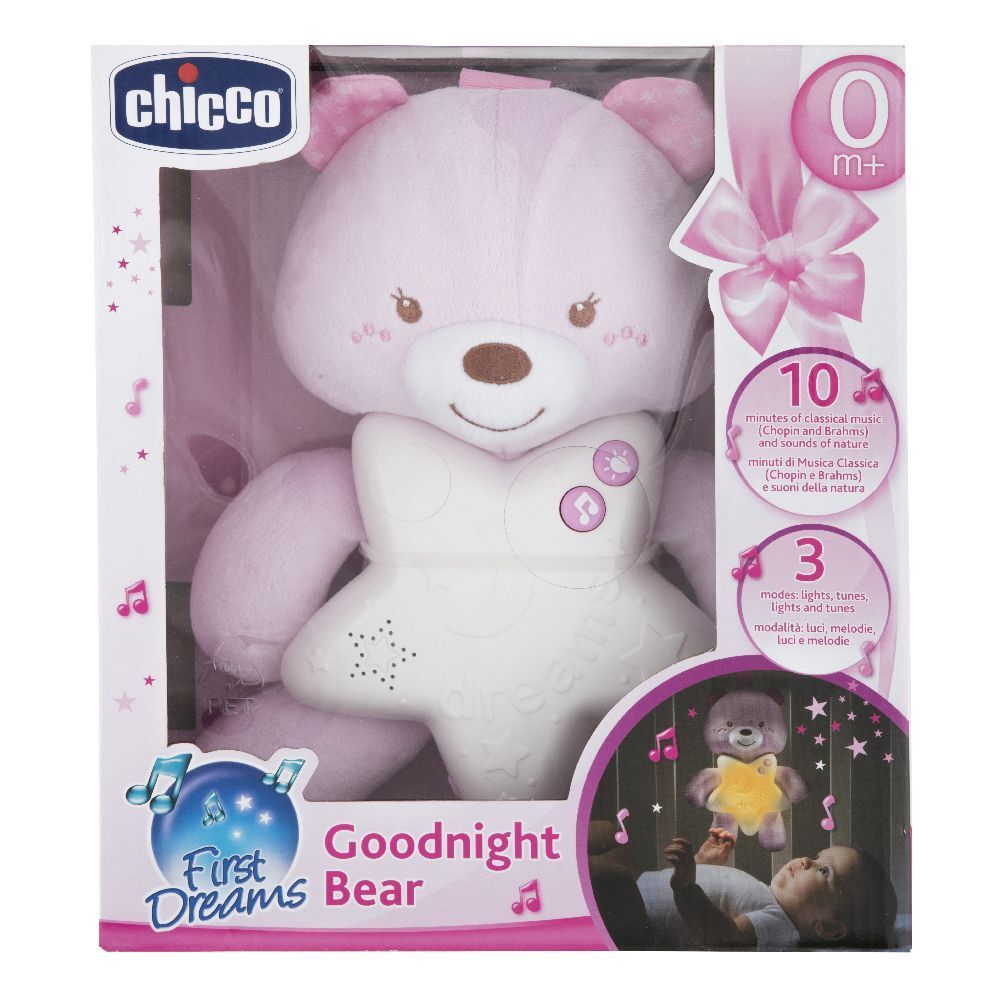 Orsetto rosa a forma di stella, confezionato. Funzioni musicali e luminose. Marchio: Chicco. Prodotto: First Dreams Goodnight Bear.