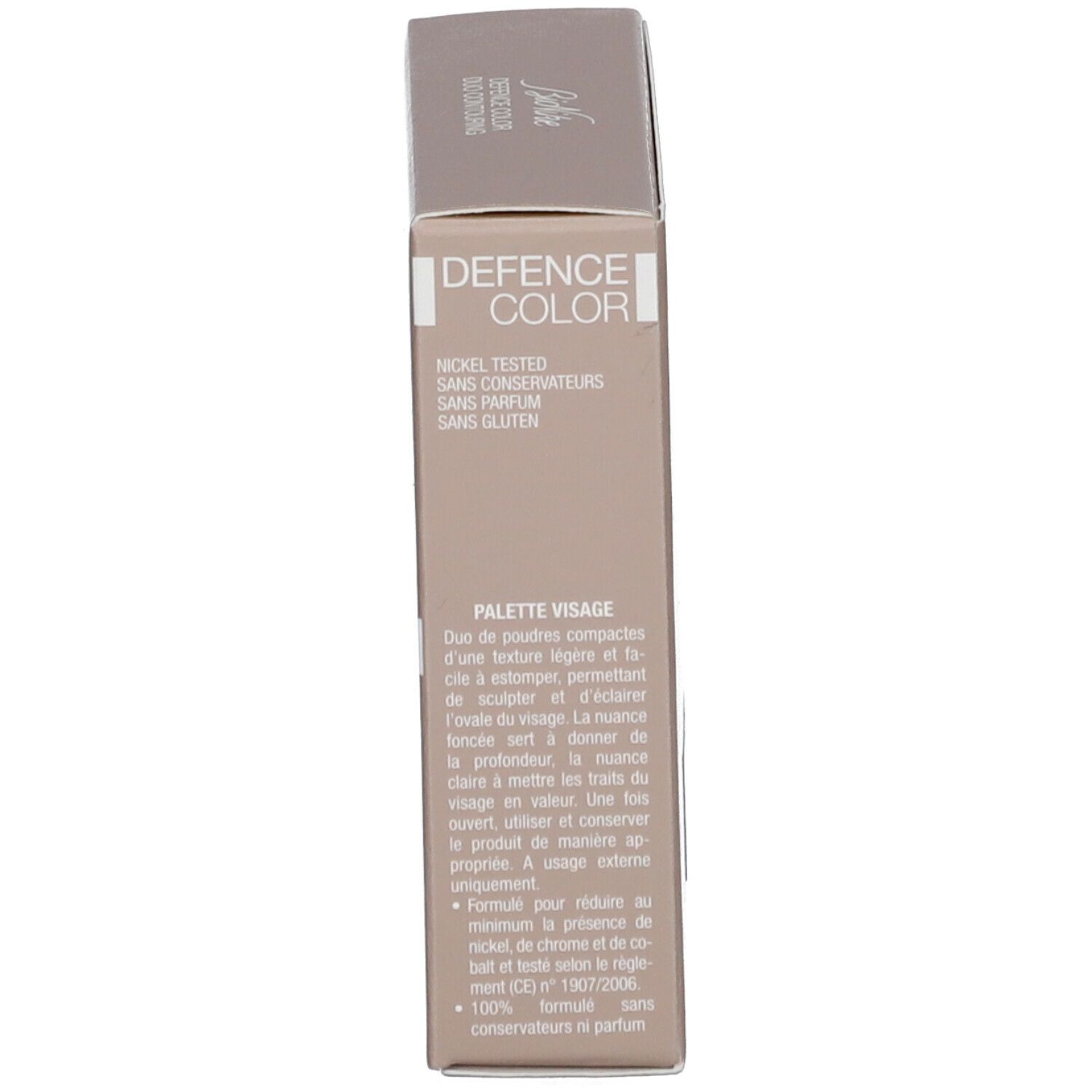 Confezione del prodotto, vista laterale. Testo: Defence Color, Nickel tested, senza conservanti, senza profumo, senza glutine.