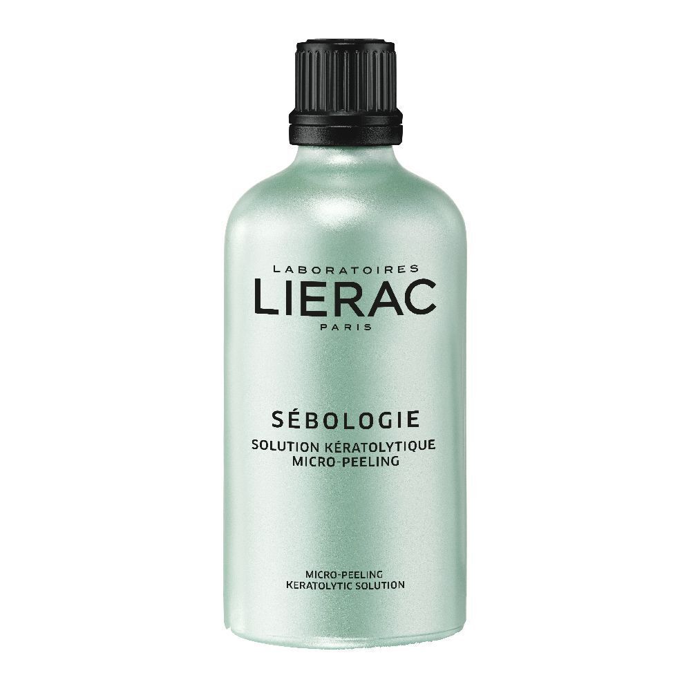 Grüne Flasche mit schwarzem Deckel. Aufschrift: LIERAC, SÉBOLOGIE, SOLUTION KÉRATOLYTIQUE, MICRO-PEELING.